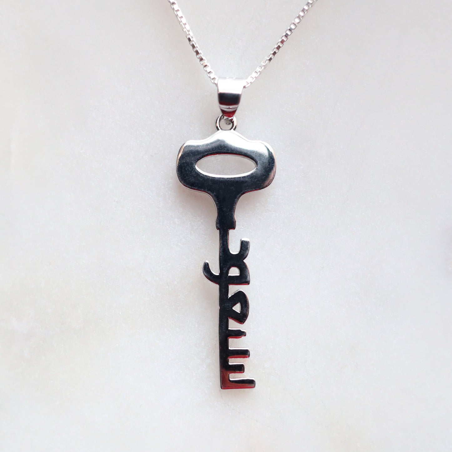 We Will Return Key Pendant
