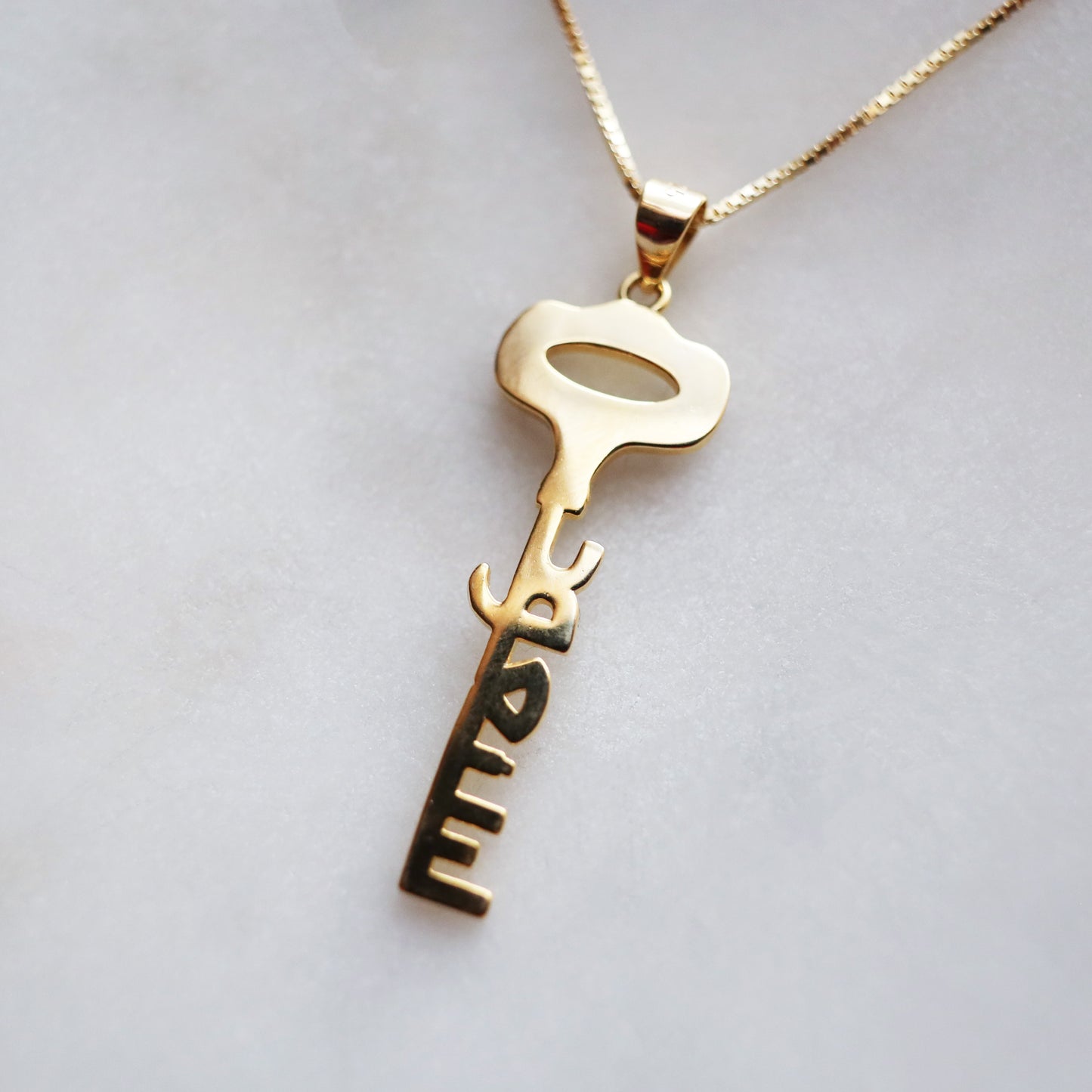We Will Return Key Pendant