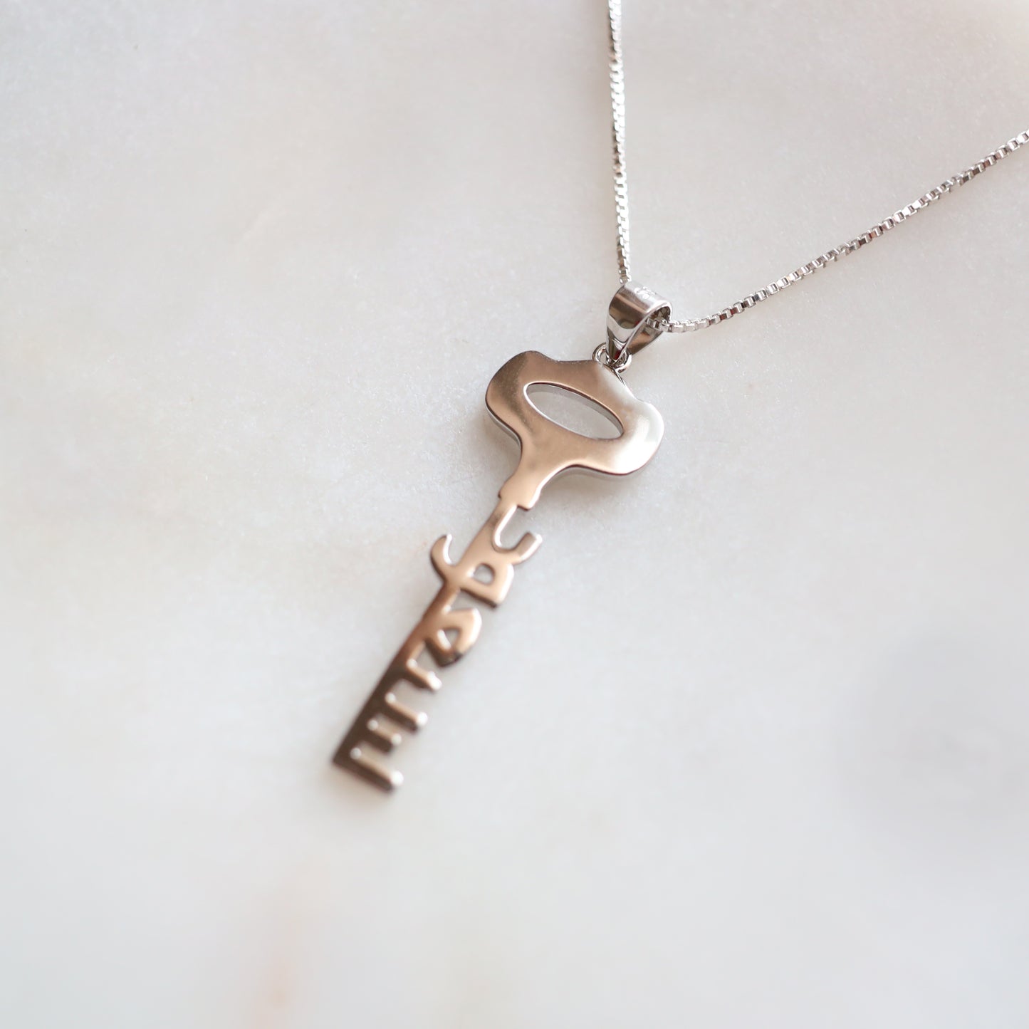 We Will Return Key Pendant