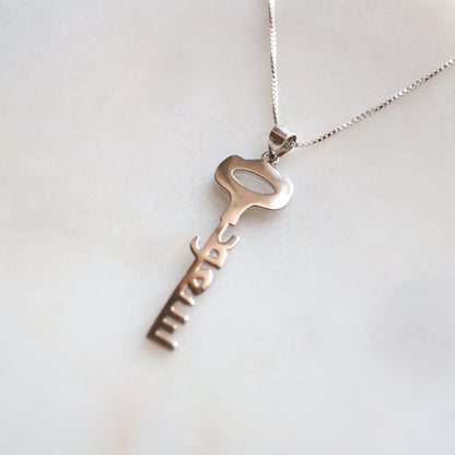 We Will Return Key Pendant